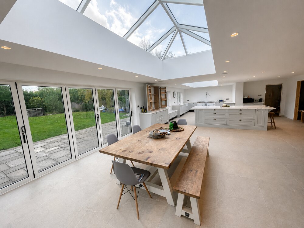 White aluminium bi-fold doors and roof lantern in a Lincolnshire kitchen extension