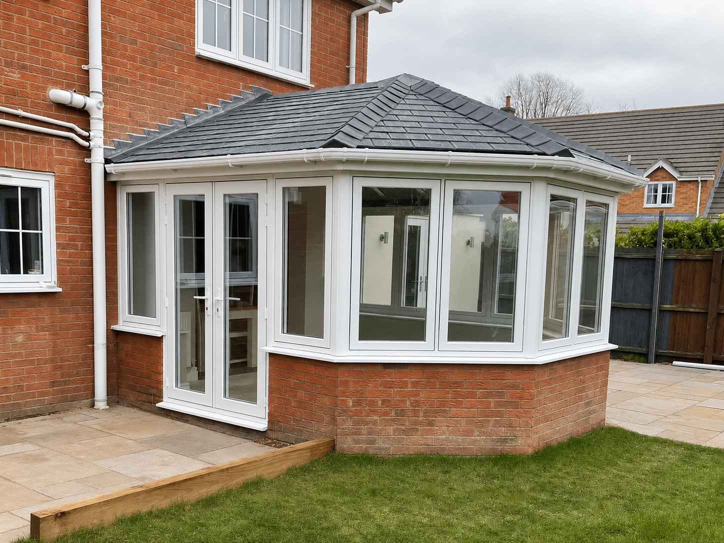 Tiled warm roof conservatory with bi-fold doors in Bourne, Lincolnshire