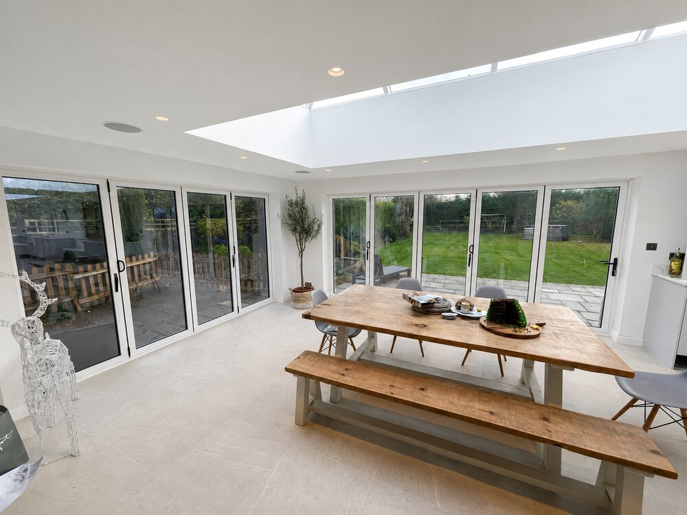 Corner aluminium bi-fold door installation with roof lantern in Rutland