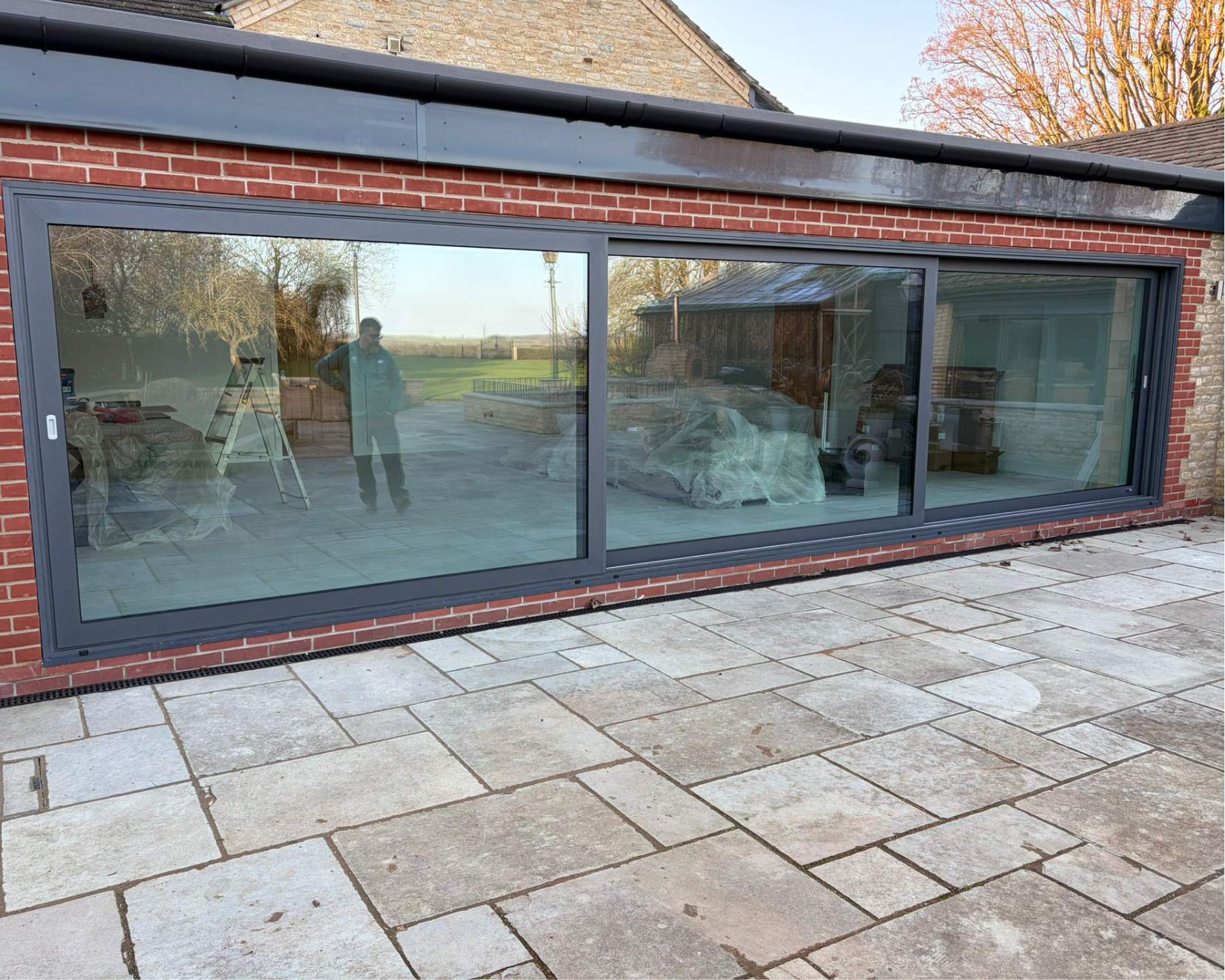 Exterior view of aluminium sliding patio doors on a Wansford home