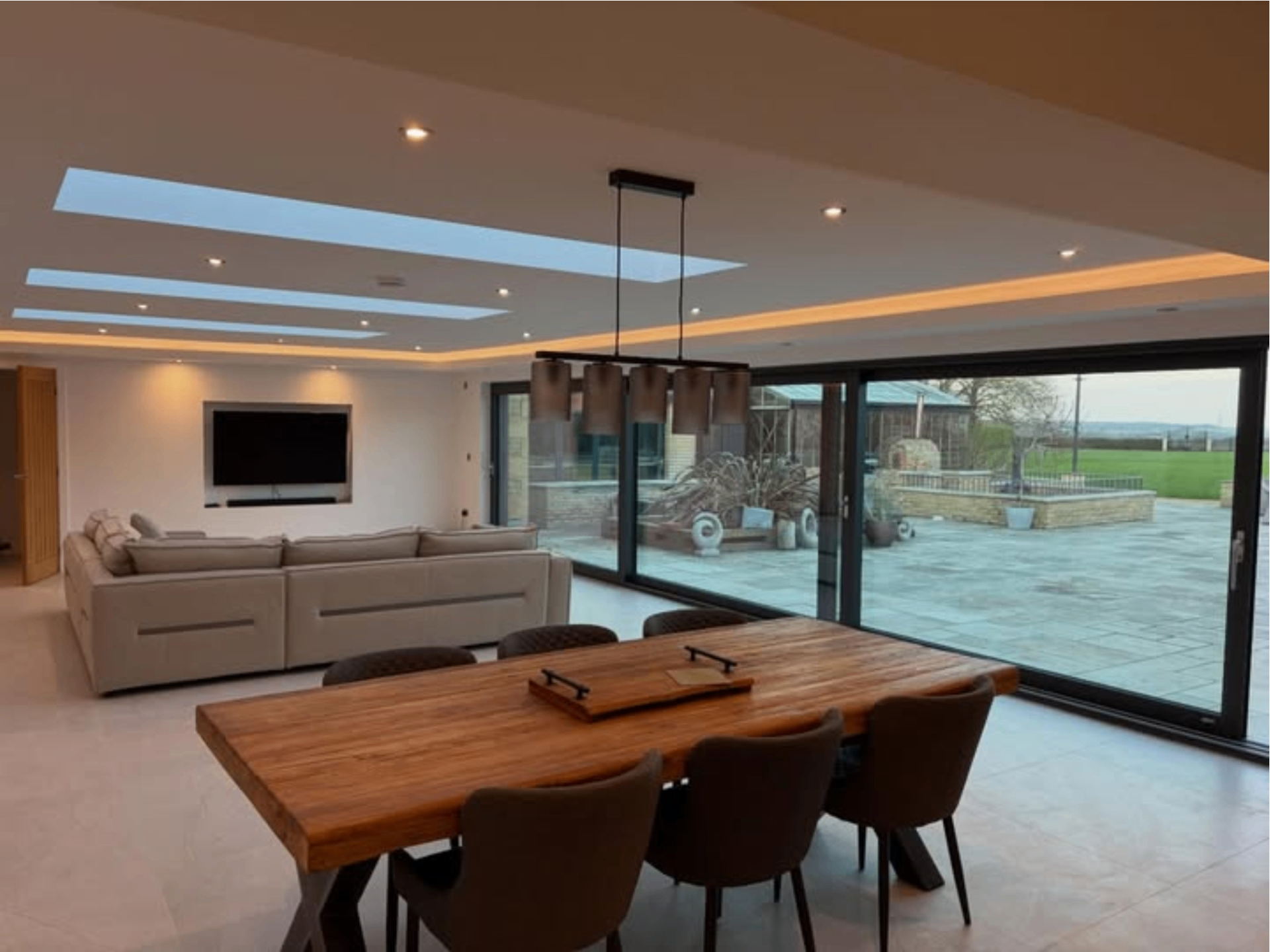 Aluminium sliding patio doors in a living room at Wansford, Cambridgeshire