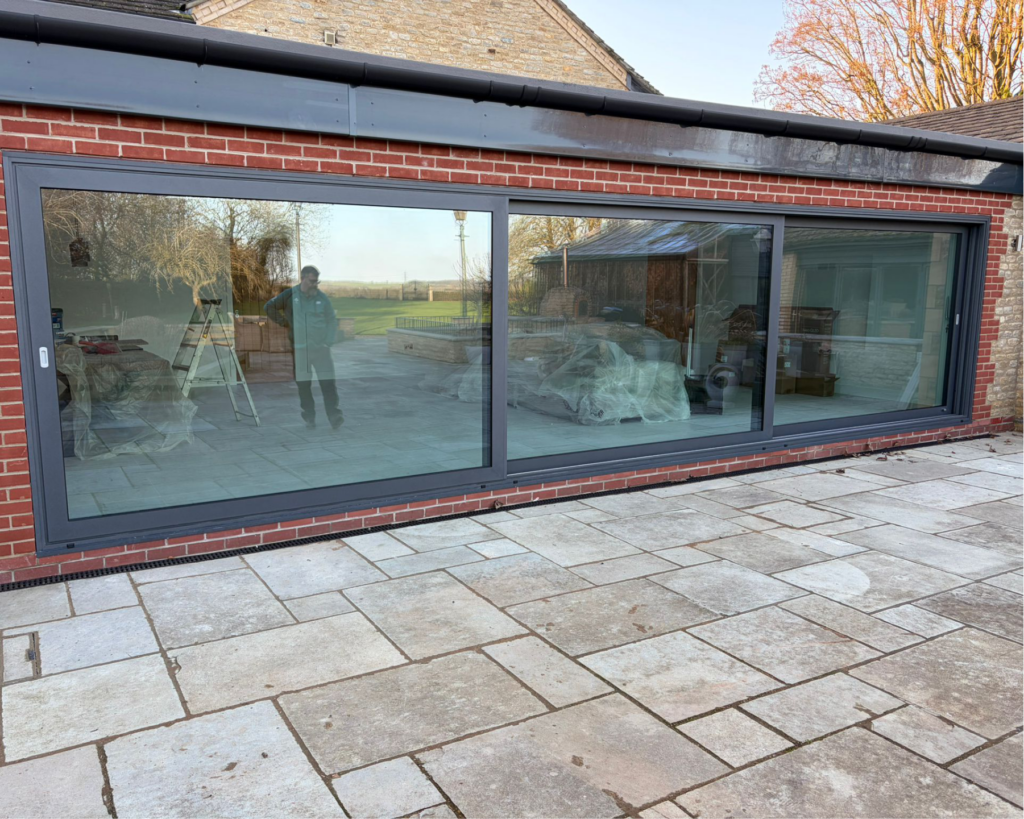 Black aluminium double glazed internal door fitted in Wansford near Peterborough
